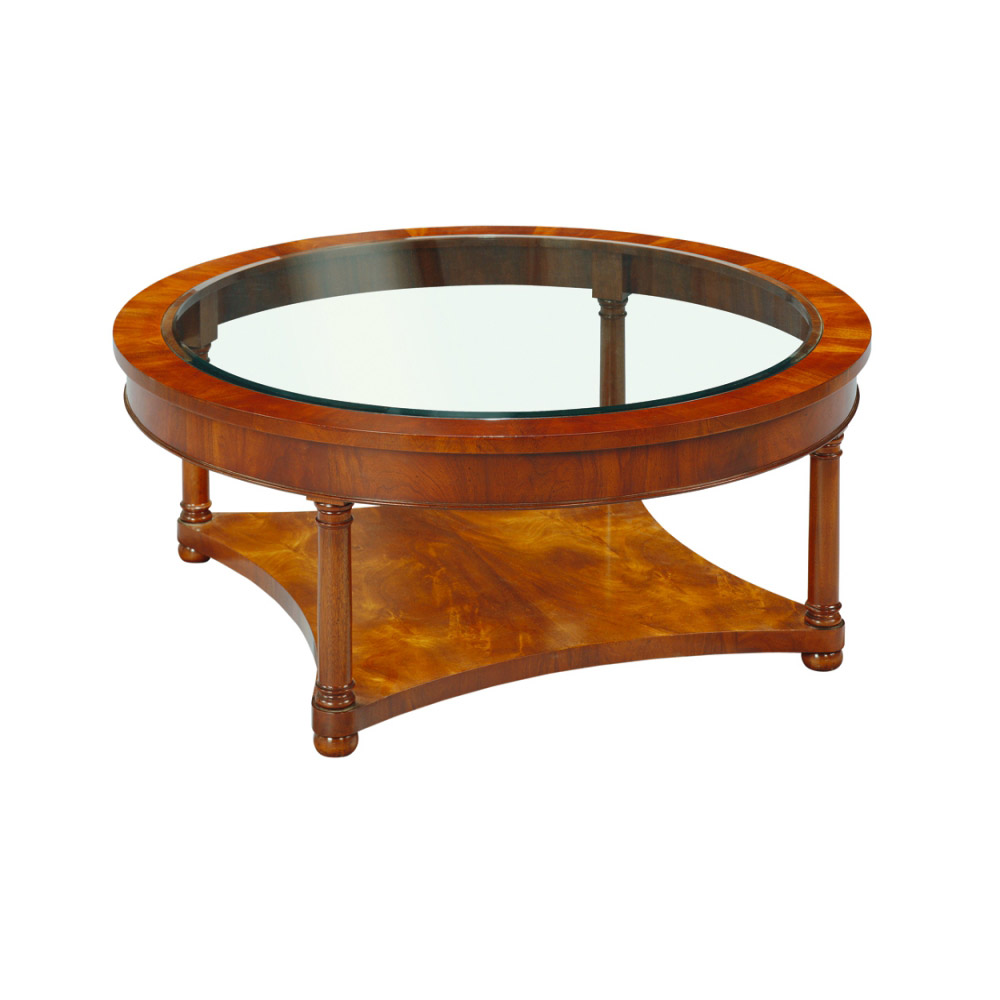 Mahogany circular coffee table with glass top